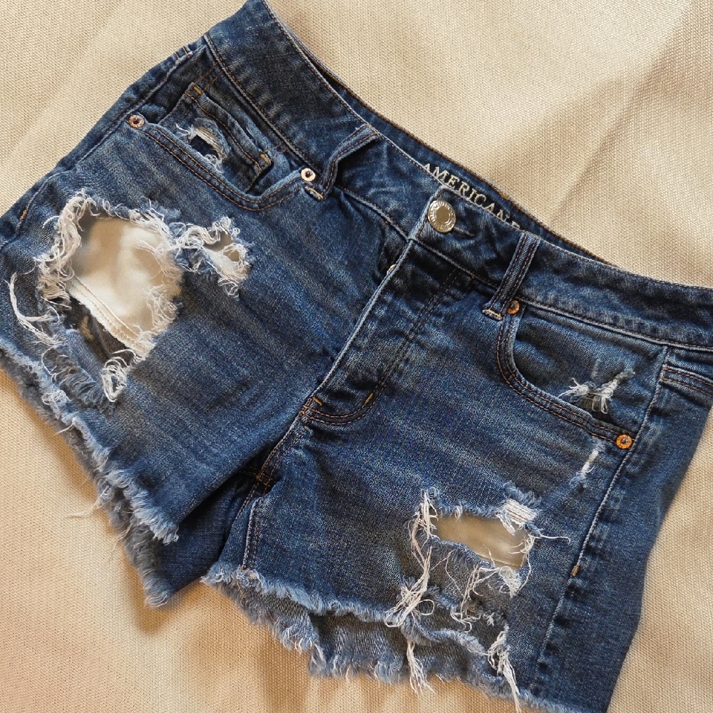 American Eagle Outfitters Women's Ripped Blue Jean Shorts Tomgirl Shortie Size 4